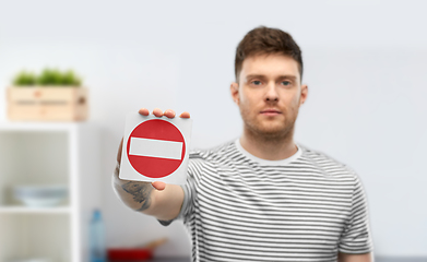 Image showing young man showing stop sign