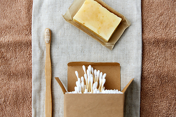 Image showing wooden toothbrush, handmade soap cotton swabs