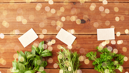 Image showing greens, spices or medicinal herbs on wooden boards