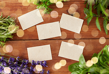 Image showing greens, spices or medicinal herbs on wood