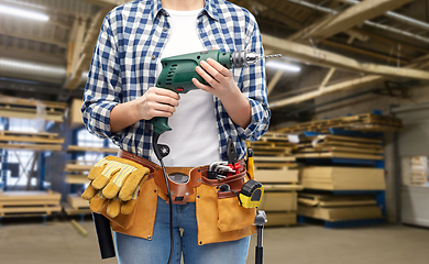 Image showing woman or worker with drill and work tools