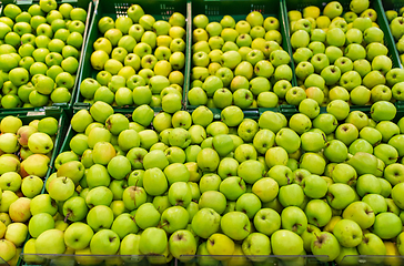 Image showing green apples at grocery store or market