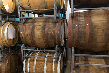 Image showing wooden barrels at craft brewery or winery