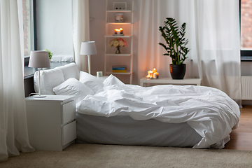 Image showing cozy bedroom with white linen on bed