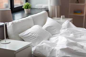 Image showing cozy bedroom with white linen on bed