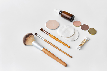 Image showing make up brushes, cosmetics and cotton swabs