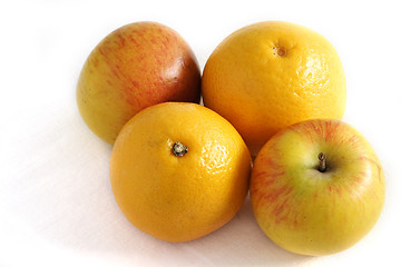 Image showing four apples and oranges