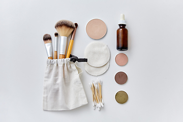 Image showing make up brushes, cosmetics and cotton swabs