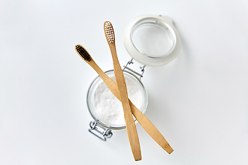 Image showing washing soda and wooden toothbrushes