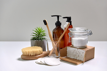 Image showing wooden toothbrush, cotton pads and swabs in box