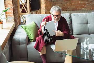 Image showing Mature senior older man during quarantine, realizing how important stay at home during virus outbreak