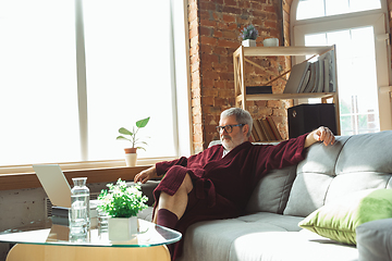 Image showing Mature senior older man during quarantine, realizing how important stay at home during virus outbreak