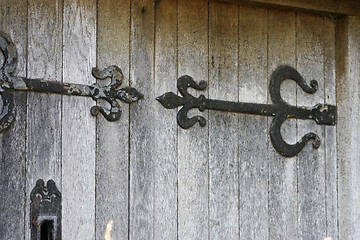 Image showing old decayed hinges