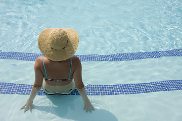 Image showing Relaxing at the pool