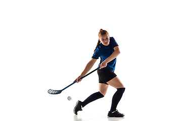 Image showing Floorball female player isolated on white studio background, action and motion concept