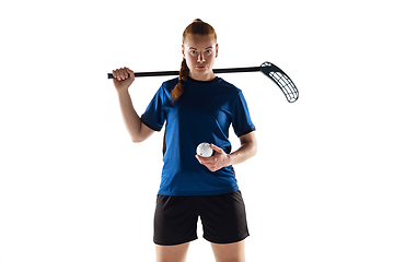 Image showing Floorball female player isolated on white studio background, action and motion concept