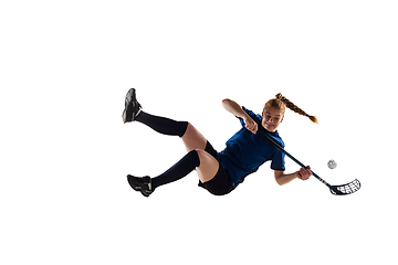 Image showing Floorball female player isolated on white studio background, action and motion concept