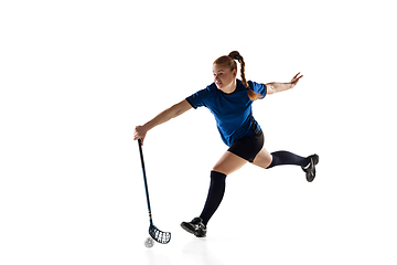 Image showing Floorball female player isolated on white studio background, action and motion concept