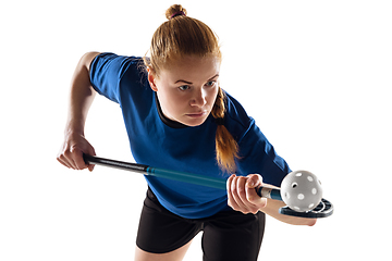 Image showing Floorball female player isolated on white studio background, action and motion concept