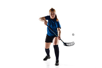 Image showing Floorball female player isolated on white studio background, action and motion concept