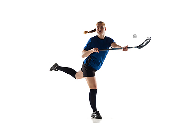 Image showing Floorball female player isolated on white studio background, action and motion concept