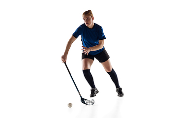 Image showing Floorball female player isolated on white studio background, action and motion concept