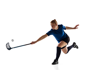 Image showing Floorball female player isolated on white studio background, action and motion concept