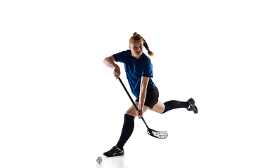 Image showing Floorball female player isolated on white studio background, action and motion concept