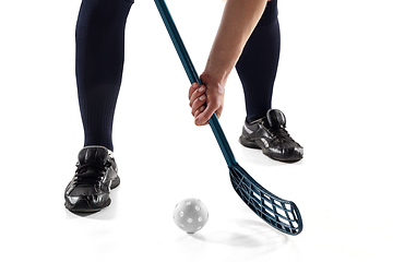 Image showing Floorball female player isolated on white studio background, action and motion concept