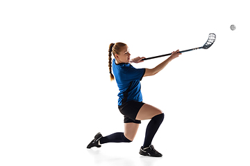 Image showing Floorball female player isolated on white studio background, action and motion concept