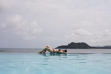 Image showing woman enjoying the paradise 