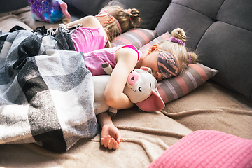 Image showing Quiet little girls sleeping in a bedroom in cute pajamas, home style and comfort