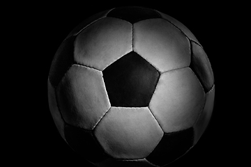 Image showing Professional sport equipment isolated on black studio background. Soccer ball.