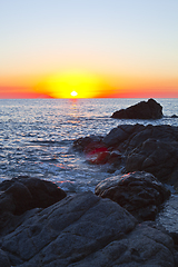 Image showing Sunset on the rocky shore. Tyrrhenian Sea.