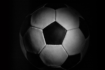 Image showing Professional sport equipment isolated on black studio background. Soccer ball.