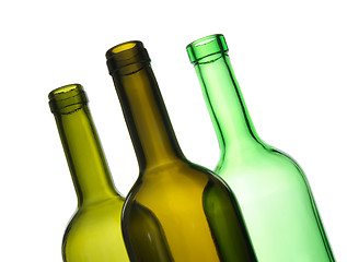 Image showing Three green empty bottles