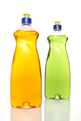 Image showing Two colourful bottles of dishwashing liquid