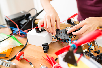 Image showing Connecting the parts on drone