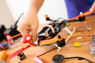 Image showing Flying drone making