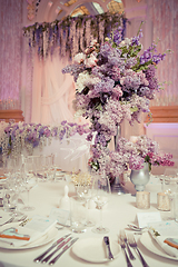 Image showing Festive table decoration in Lilac colours.