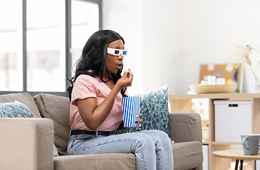 Image showing african american woman watching tv at home