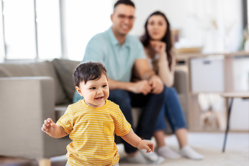 Image showing happy baby boy and parents at home