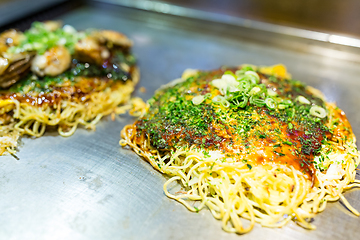 Image showing Japanese savoury pancake containing a variety ingredients