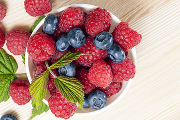 Image showing raspberries and blueberries