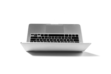 Image showing Opened laptop isolated on white studio background with copyspace