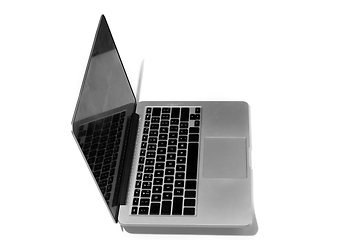 Image showing Opened laptop isolated on white studio background with copyspace