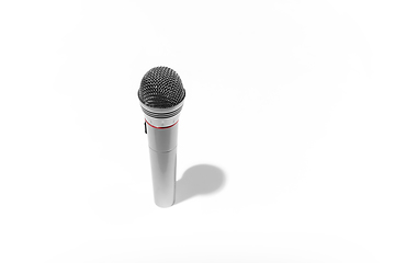 Image showing Grey wireless microphone with shadow isolated on white studio background