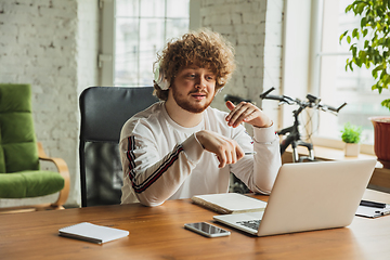 Image showing Manager or student working from home while being insulated or keep quarantine \'cause of coronavirus COVID-19. Online conference, meeting.