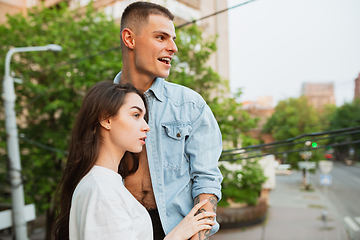 Image showing Quarantine lockdown, stay home concept - young beautiful caucasian couple enjoying new lifestyle during coronavirus worldwide health emergency