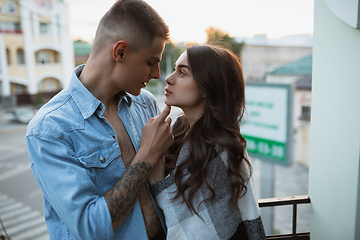 Image showing Quarantine lockdown, stay home concept - young beautiful caucasian couple enjoying new lifestyle during coronavirus worldwide health emergency